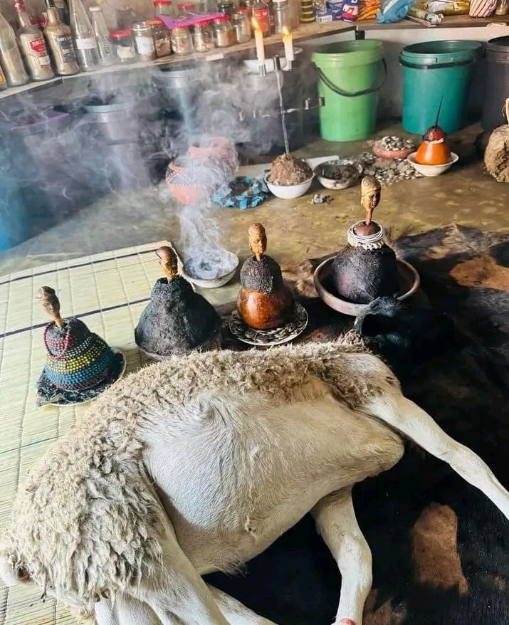 Candles and herbs used in African love spell rituals